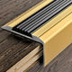 Stair Nose with Black Insert Proend INS Anodized Aluminum Gold - (28 mm) 1-3/32" x 8' 10-5/16"